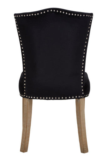 Kensington townhouse black velvet dining chair with silver nailhead trim and light wood legs for stylish townhouse dining