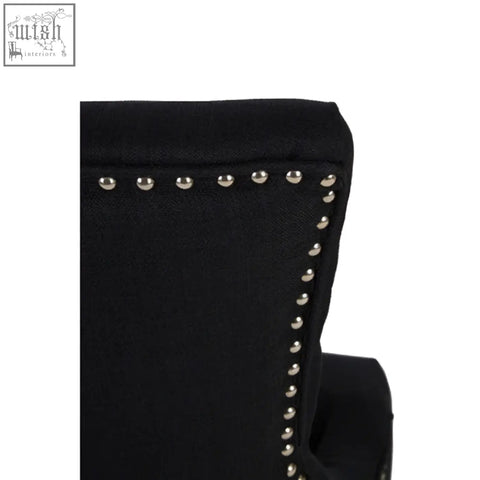 Kensington townhouse black linen dining chair with black upholstered seat and silver nailhead trim along the edge
