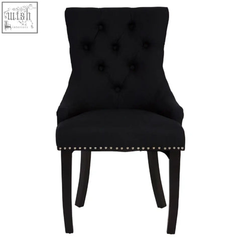 Black linen dining chair with tufted back and nailhead trim from kensington townhouse black collection