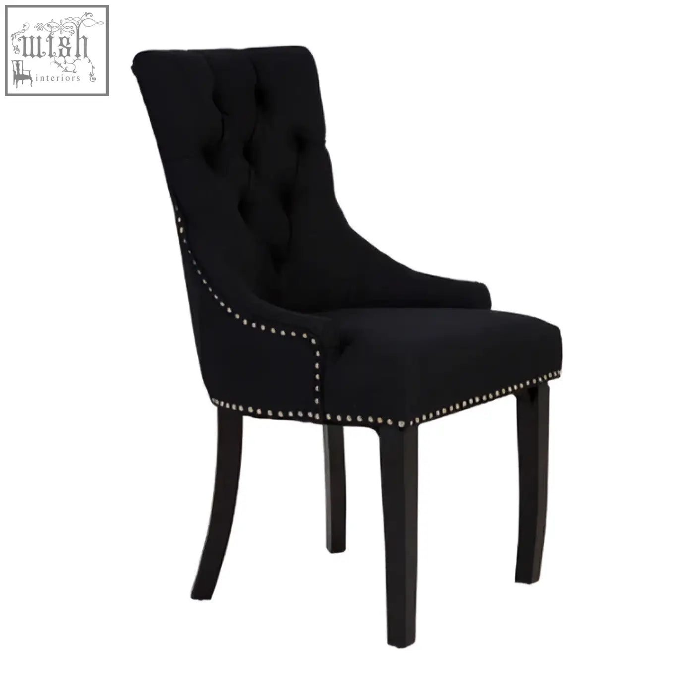 Kensington Townhouse black linen dining chair with tufted velvet, nailhead trim, and dark wood legs