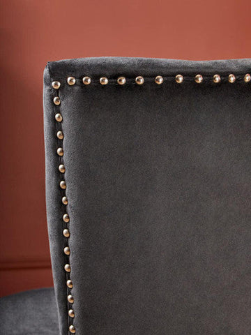 Back of kensington townhouse black winged dining chair in dark gray velvet with metallic nailhead trim