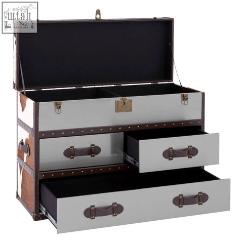 Silver and brown kensington townhouse brown and white cowhide cabinet with brass hardware and three storage drawers