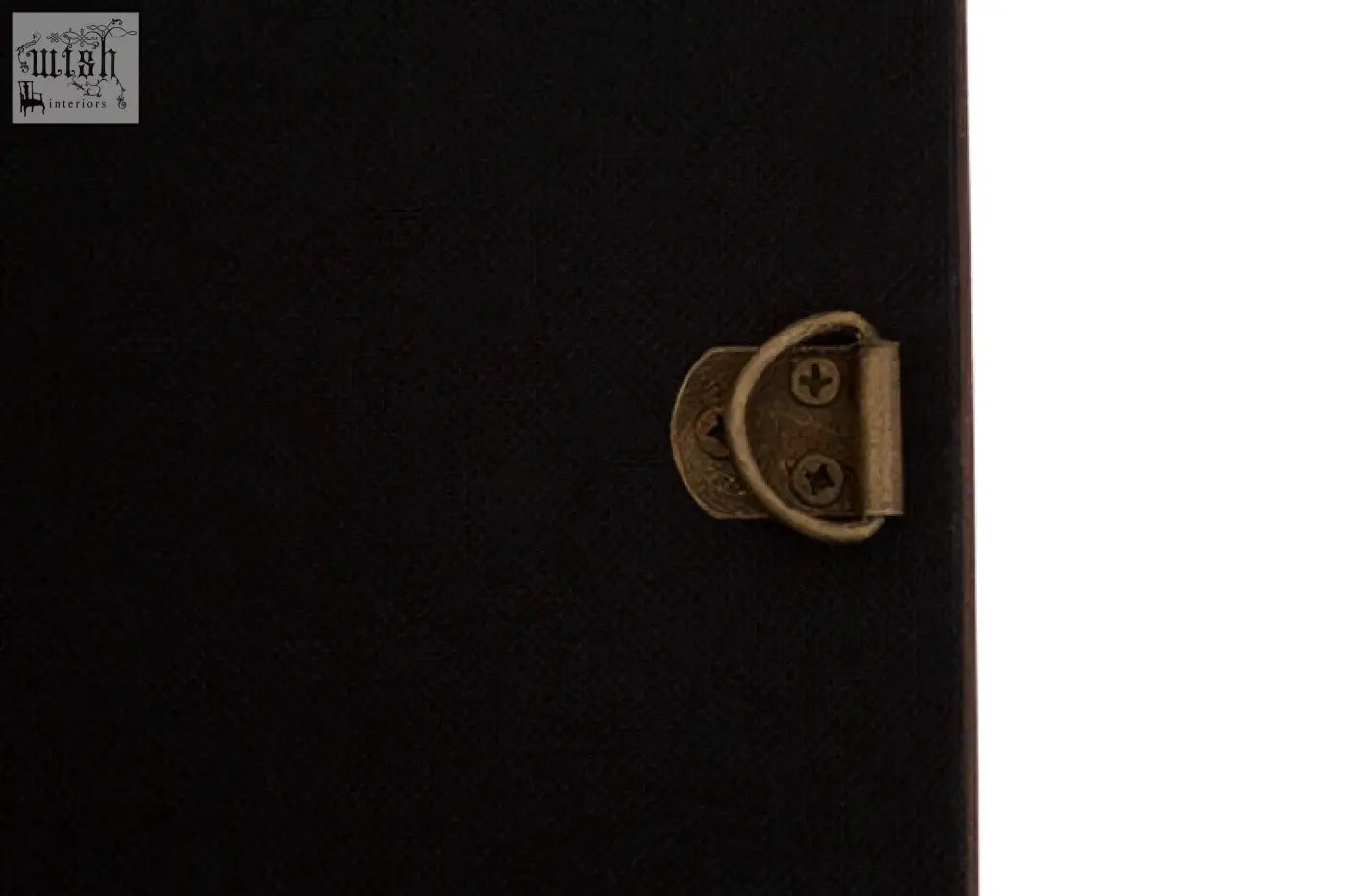 Black textured case with brass-colored clasp shown on the back of a genuine cowhide wall mirror from Kensington Townhouse