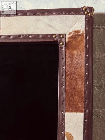 Kensington townhouse brown and white genuine cowhide wall mirror with cream cowhide frame and brass rivets