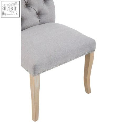 Grey linen dining chair kensington townhouse with tufted fabric and light wood legs perfect for dining room use