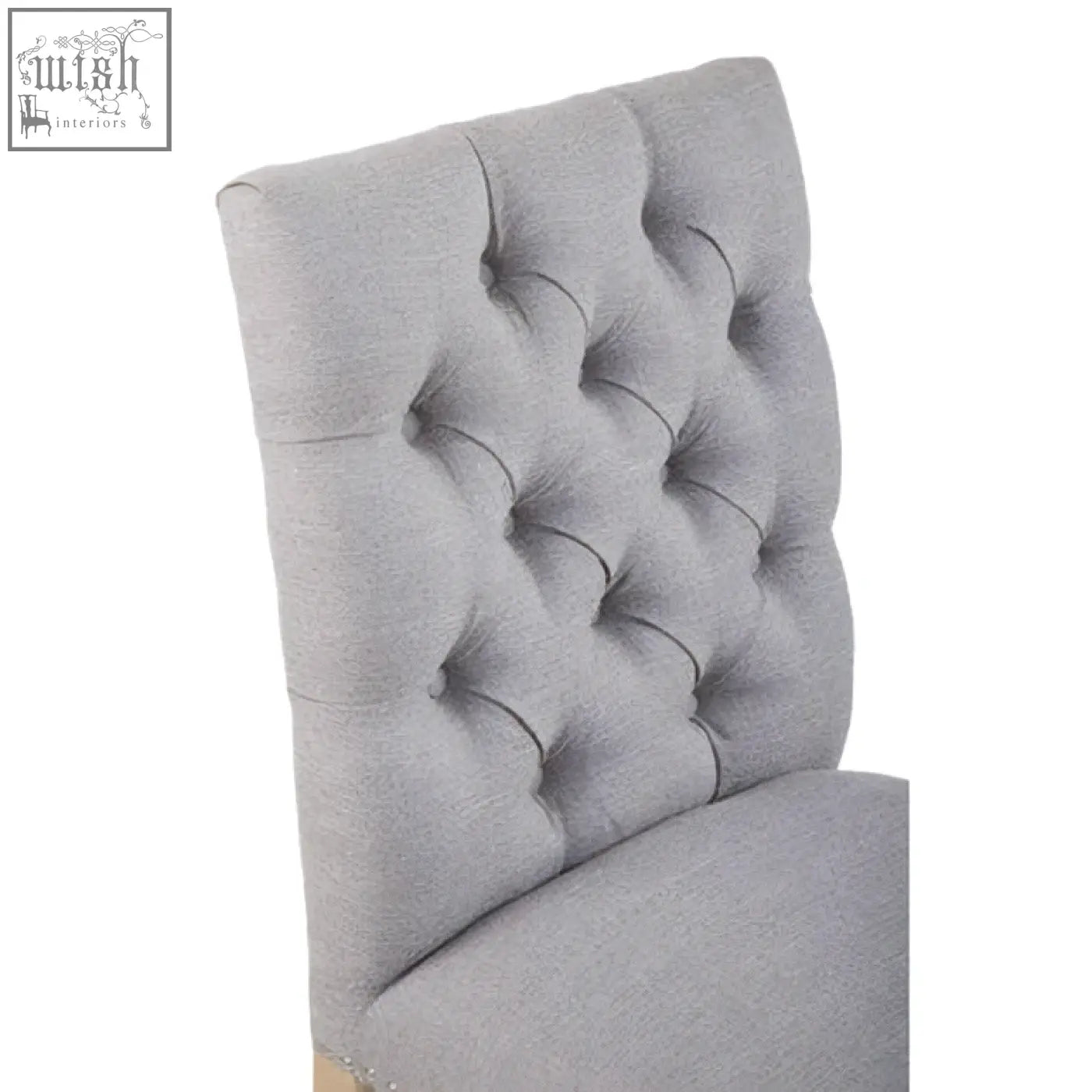 Gray tufted grey linen dining chair with classic elegant design perfect for linen dining room setups