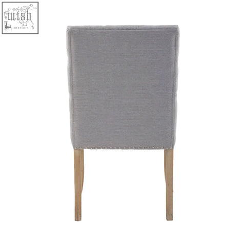 Gray linen dining chair with wooden legs from kensington townhouse perfect for stylish dining spaces