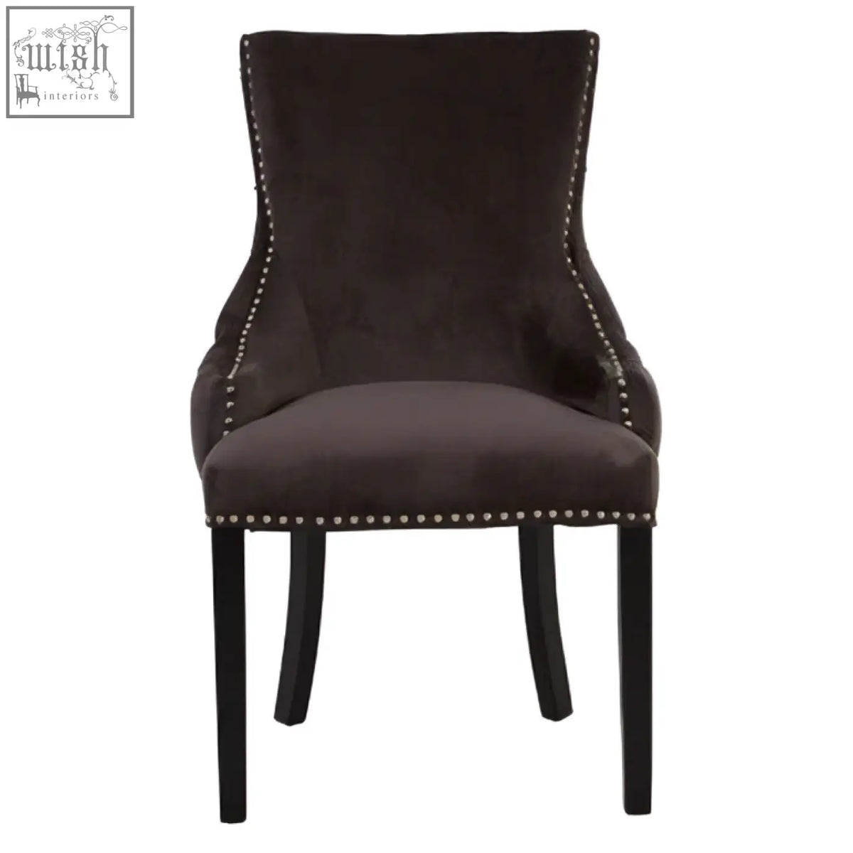 Dark brown velvet dining chair with black metal legs and silver nailhead trim in kensington townhouse grey style