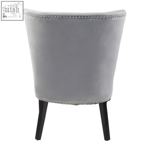 Kensington townhouse grey winged dining chair in gray velvet with black legs and silver nailhead trim