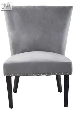 Kensington townhouse grey winged dining chair in gray velvet with black legs and silver nailhead trim