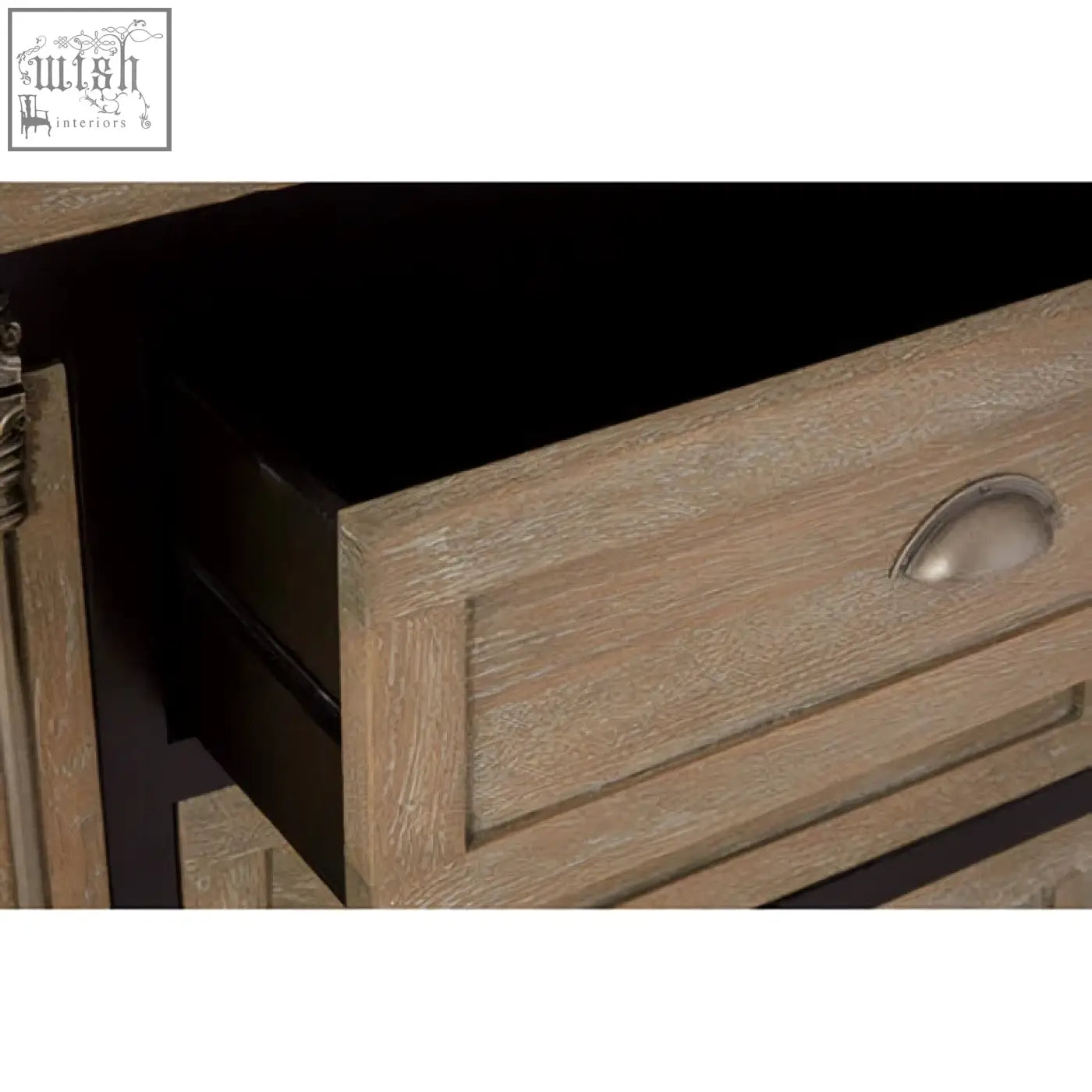 Light oak wood drawer with silver oval metal pull handle on the kensington townhouse sideboard
