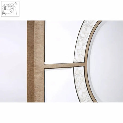 Kensington townhouse wall mirror with geometric frame brushed gold finish and intricate lace detailing on curved edge