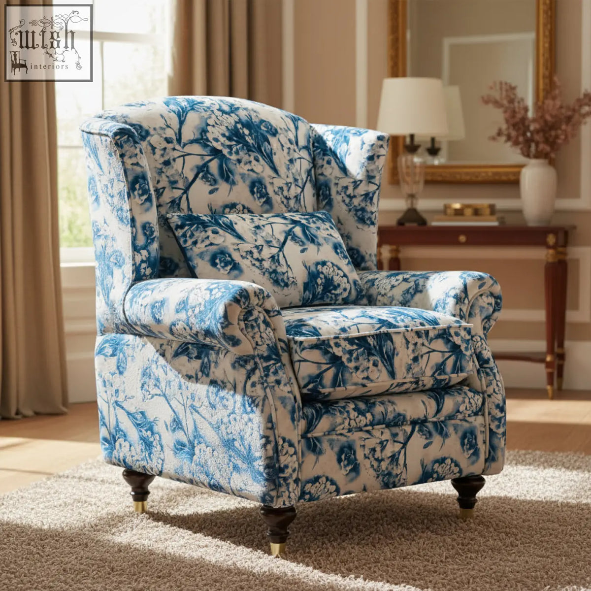 Blue and white floral patterned Kensington wing chair with wingback design and dark wooden legs for cozy seating