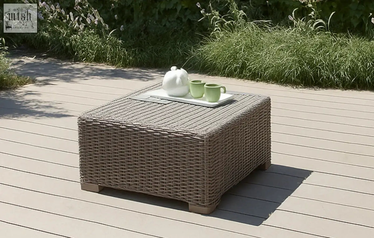 Woven gray taupe rattan coffee table by keter california taupe with rectangular tray holding white teapot and green mugs
