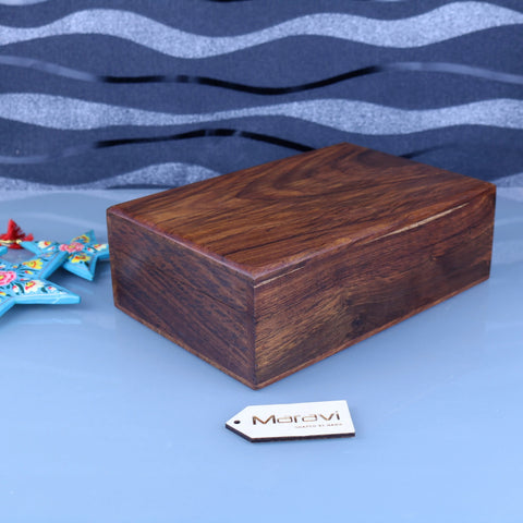 A rectangular dark brown wooden storage box with smooth finish and visible grain patterns from khalka plain wooden storage boxes