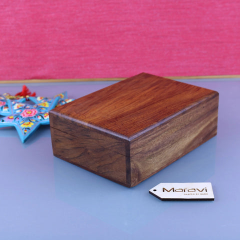 A rectangular wooden storage box with warm brown finish and natural wood grain from Khalka Plain storage boxes