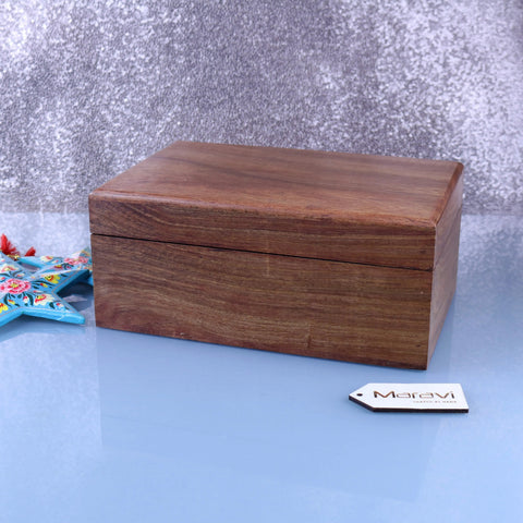 A rectangular warm brown wooden storage box with smooth finish and visible natural wood grain by Khalka Plain Wooden Storage Boxes