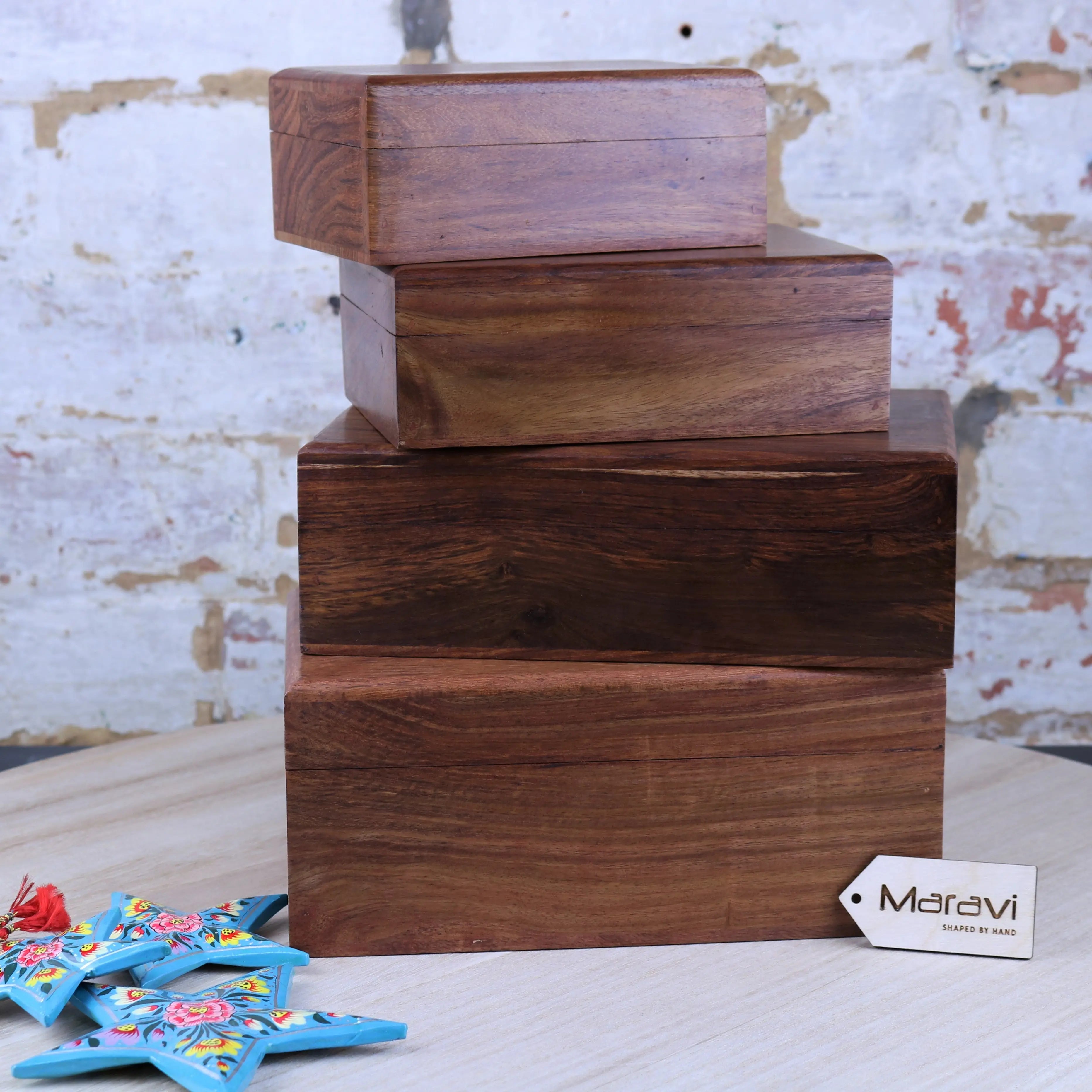 Stacked khalka plain wooden storage boxes with warm brown finish and natural wood grain for wooden storage needs