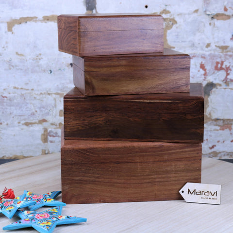 Stacked khalka plain wooden storage boxes with warm brown finish and natural wood grain for wooden storage needs