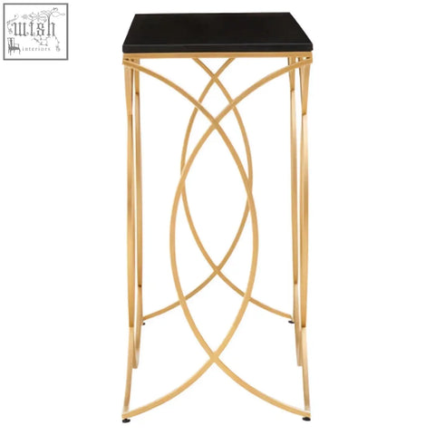 Kia black and gold console table with a sleek black top and gold console base featuring interwoven geometric design