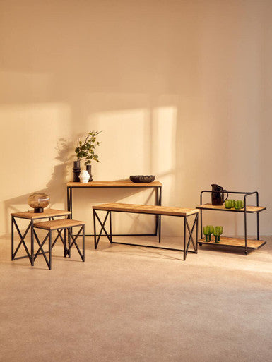 Industrial-style kickford parquet fir wood coffee table with black metal frame and cross-braced legs