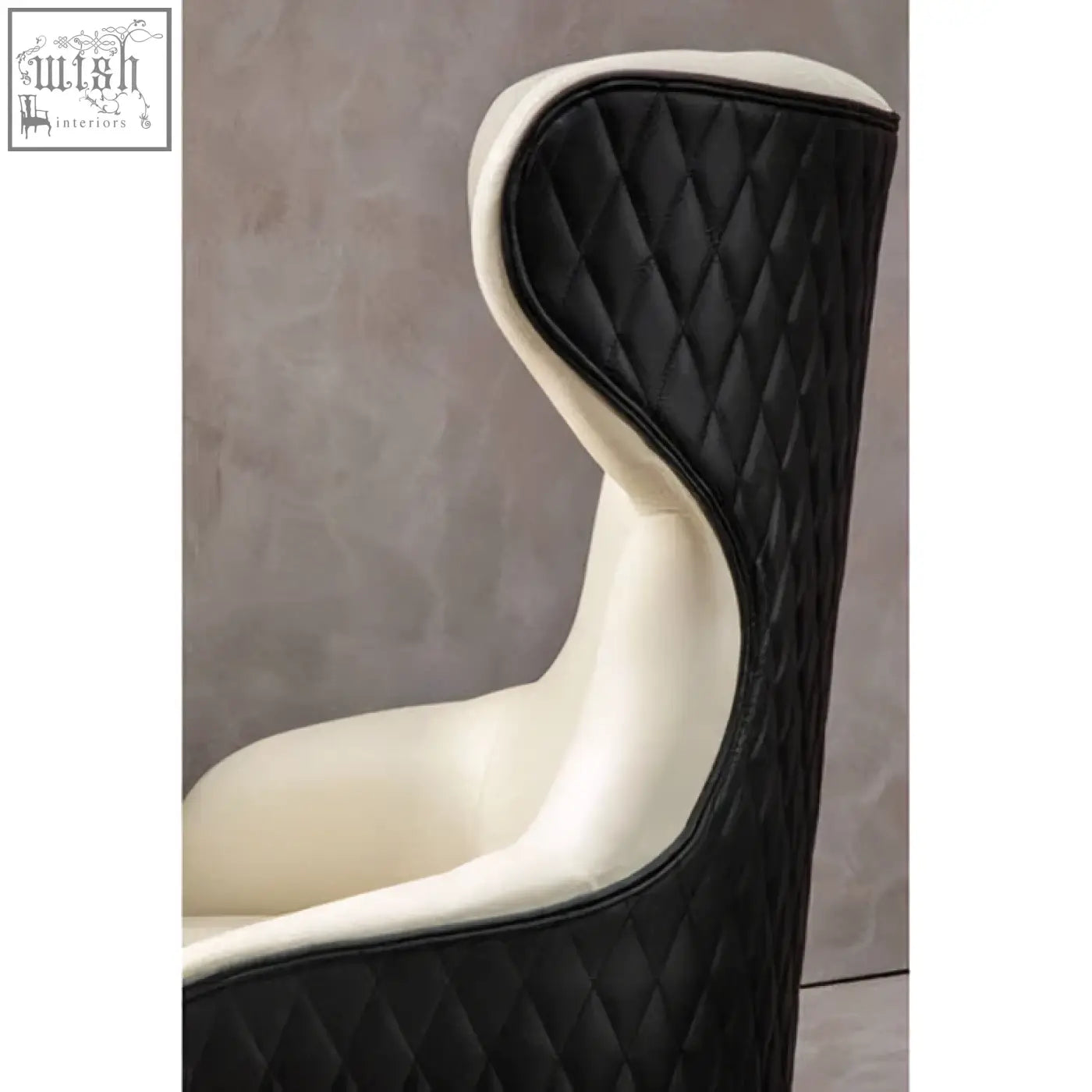 Black and cream quilted kiev ivory faux leather ivory armchair with a sleek modern high-back design
