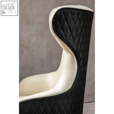 Black and cream quilted kiev ivory faux leather ivory armchair with a sleek modern high-back design