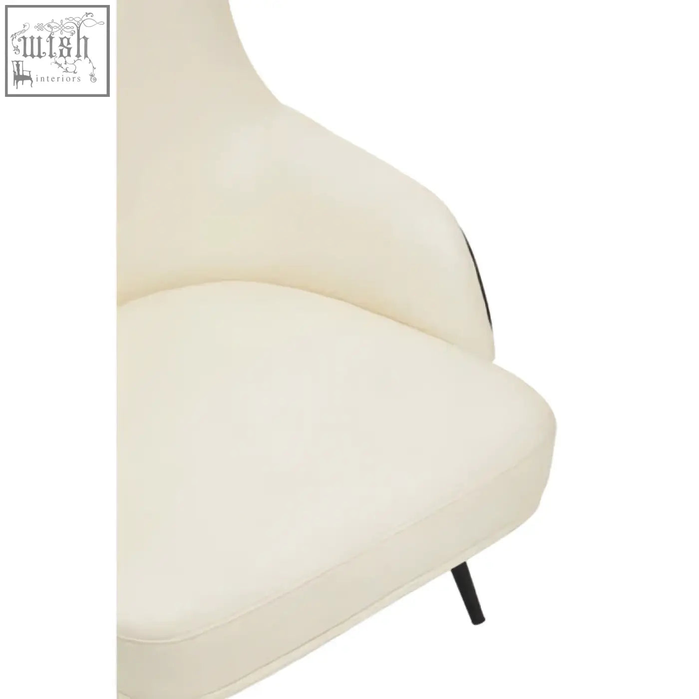 Cream-colored kiev ivory armchair with sleek modern design, faux leather upholstery, and black metal legs