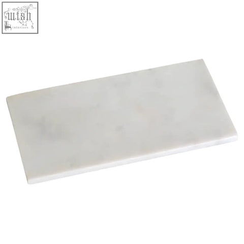 Kindia off white rectangular marble board featuring a white rectangular marble tile with subtle gray veining