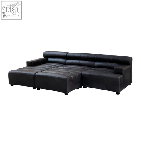 Black leather sectional sofa with tufted cushions and modular design in king antique black leather style