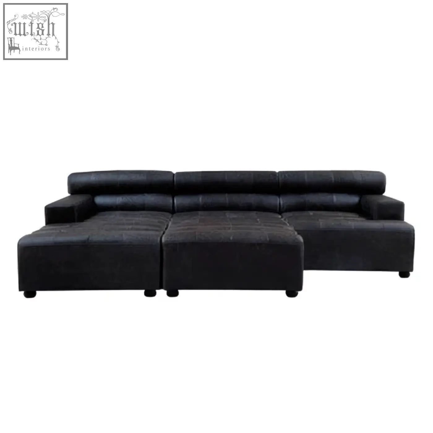 King antique black leather modular ottoman with tufted cushions and low-profile legs in antique black leather