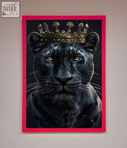 A striking king panther framed wall art featuring a black panther with golden eyes wearing a gold crown on pink background