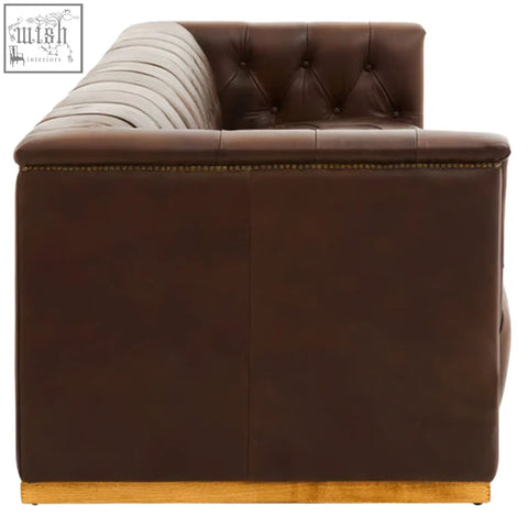 King three seater chesterfield sofa in dark brown features genuine leather with light gray backrest and gold nailhead trim