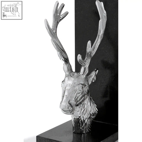 Silver deer head stag bookends with detailed antlers and textured surface on black marble bases for stylish decor