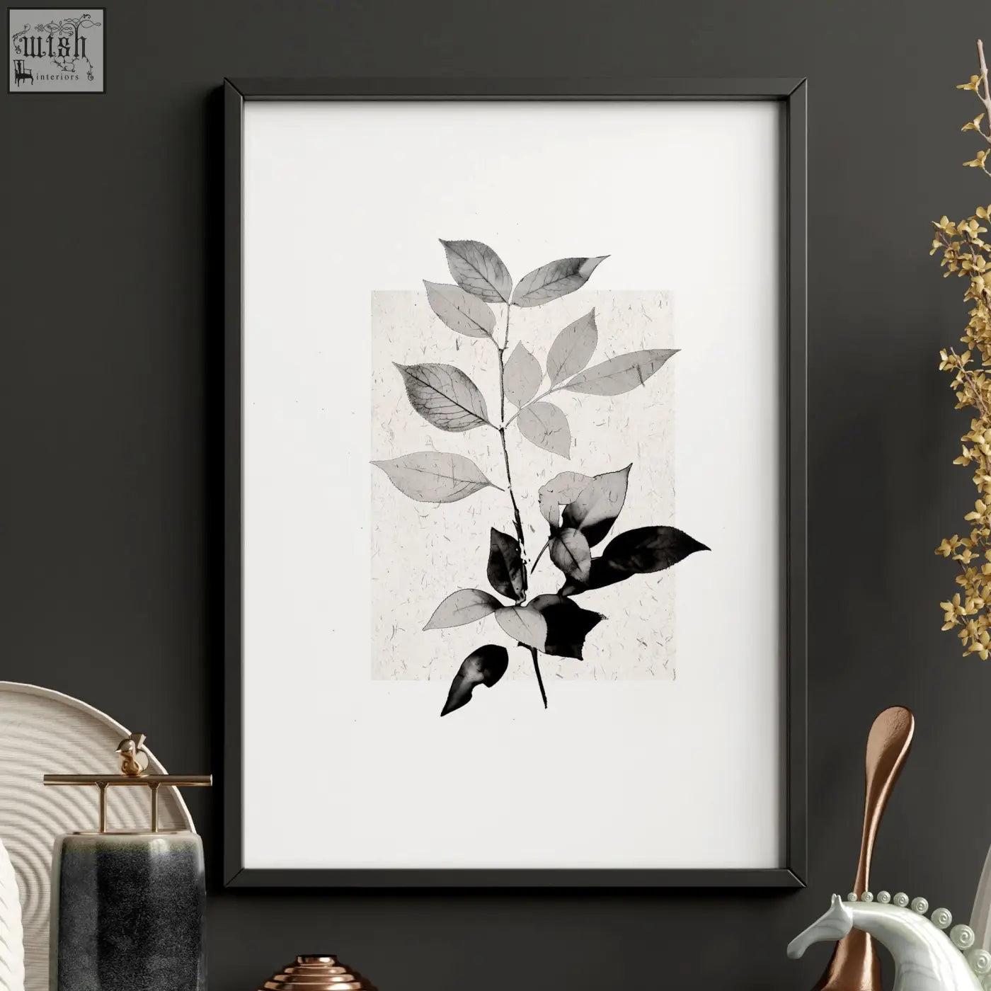 Black-framed minimalist botanical art wall decor with gray leaves on textured off-white paper perfect for kitchen art wall