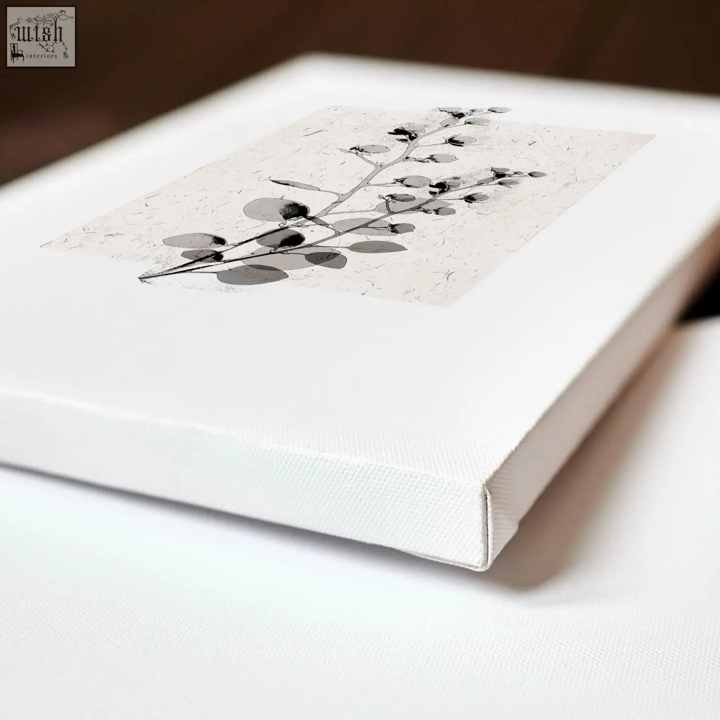 White canvas print with minimalist black and gray eucalyptus illustration on textured paper kitchen art wall decor