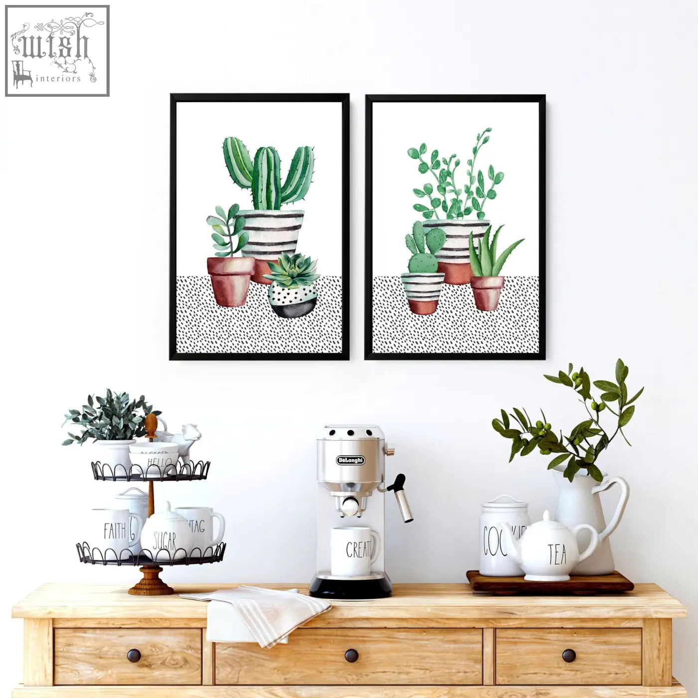 Silver delonghi espresso machine with black base and chrome accents next to kitchen prints featuring succulent plants wall art
