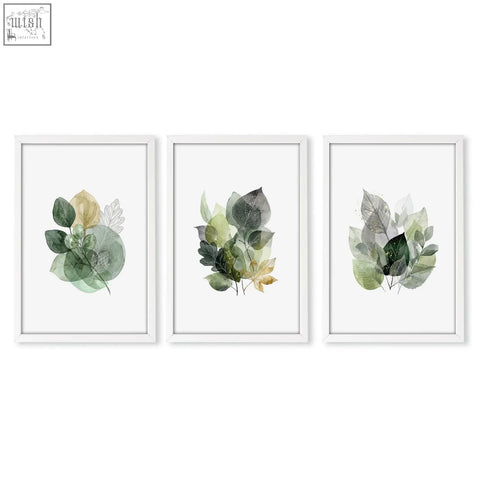 Set of three framed botanical watercolor prints with green and gold tones perfect for kitchen wall artwork