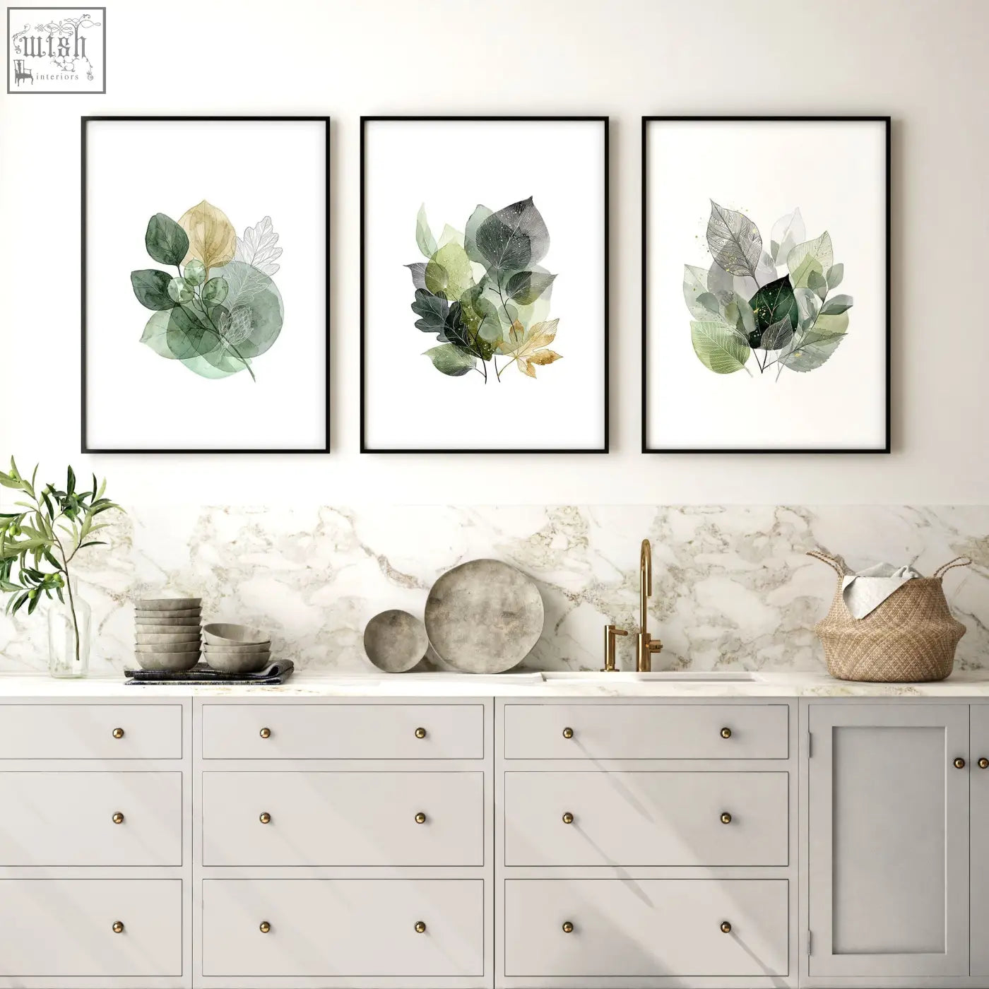 Three framed botanical prints with watercolor leaves in muted greens and gold tones perfect for kitchen wall artwork