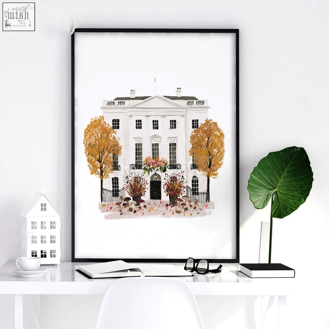 Black-framed watercolor travel art prints of the white house with autumnal trees perfect for kitchen wall decor