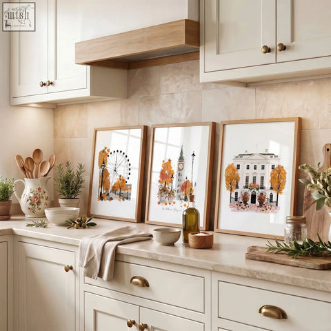 Three framed autumn-themed london travel art prints with light wood frames perfect for kitchen wall decor