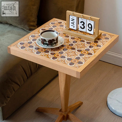 Kitty side table with cherry wood frame and mosaic tile top in beige brown and cream circular patterns