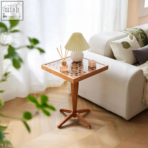 Wooden kitty side table with a mosaic top and star-shaped base in cherry wood finish