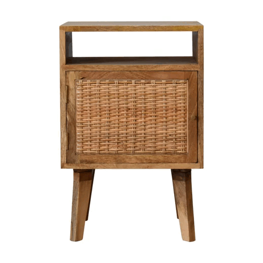 Rustic oak rattan bedside table with woven cane panel and spacious interior on tapered mango wood legs