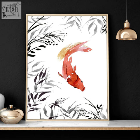 A framed koi fish japanese art print featuring a vibrant orange koi fish with black and silver foliage in a gold frame