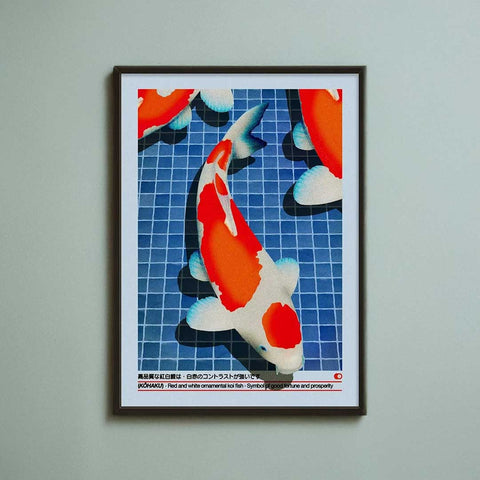 A framed koi fish print featuring a vibrant red and white koi swimming over blue tiled water with japanese text