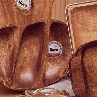 Wooden kora acacia apple-shaped serving dish with three compartments and warm brown finish showing natural wood grain