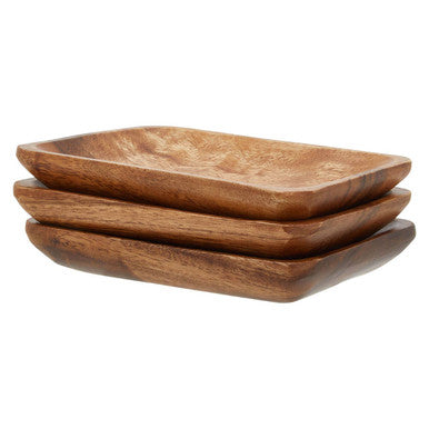 Stacked kora acacia set of three serving dishes with warm brown acacia wood finish and visible wood grain texture