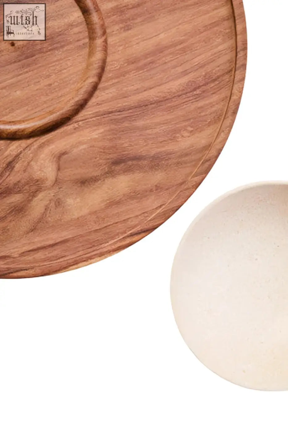 Light brown acacia wood serving board with circular cutout for cream marble chip and dip platter use