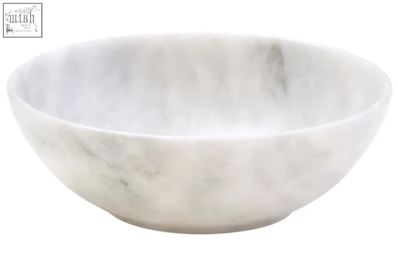 A smooth white marble chip bowl with subtle gray veining on the kora acacia wood chip and dip platter